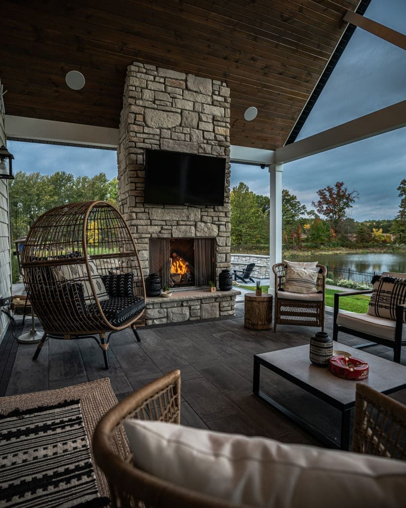 Outdoor entertaining area with fireplace installed by Ground Works