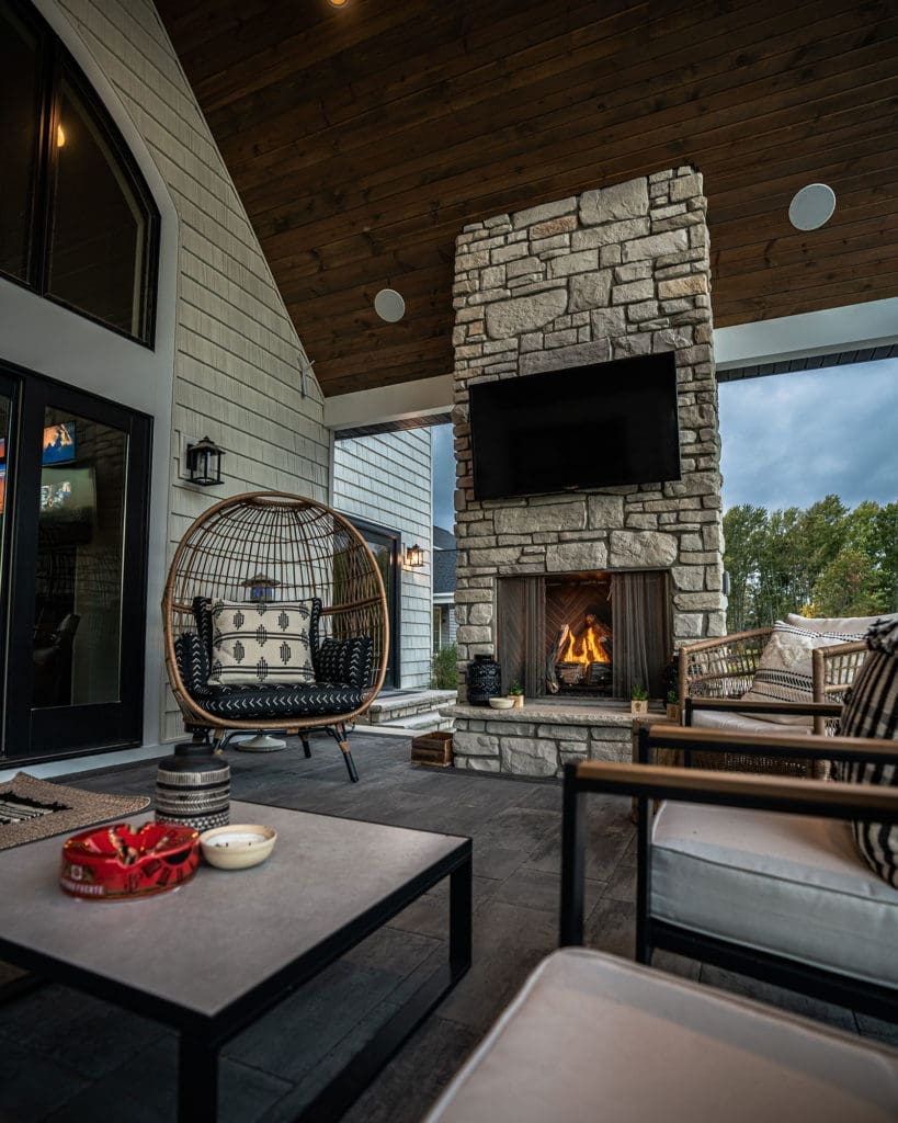 Outdoor entertaining area with fireplace installed by Ground Works