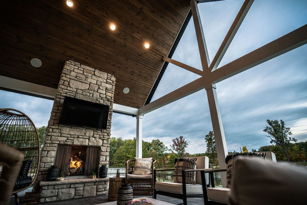 Outdoor entertaining area with fireplace installed by Ground Works