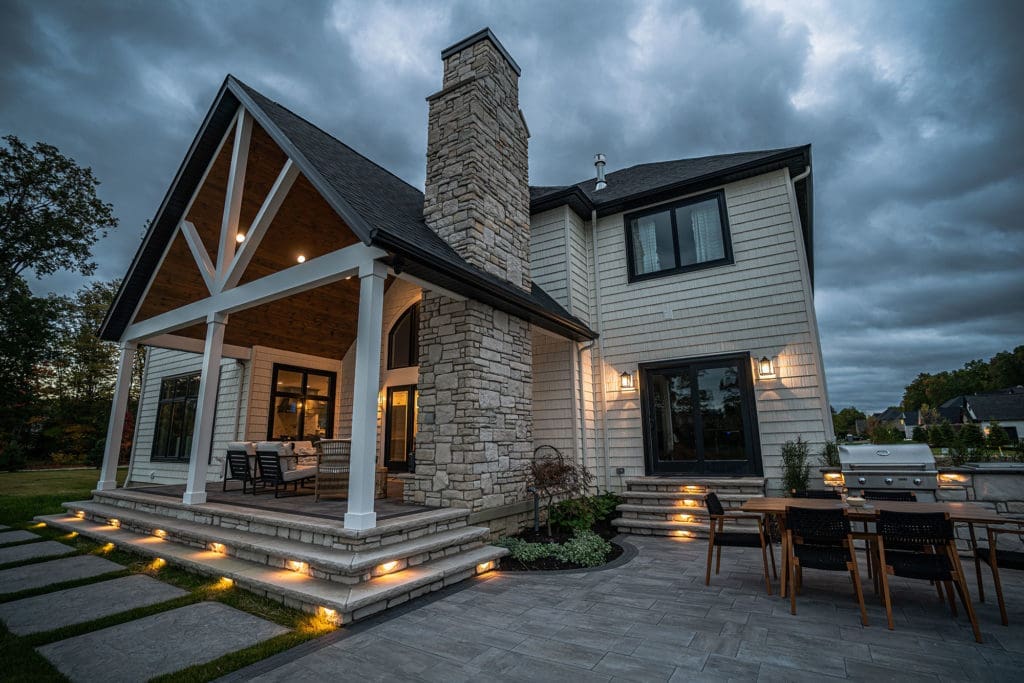 Residential outdoor light installation at upscale home by Ground Works